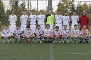 The Dos FC U16 soccer club collected 600 pounds of food for the Maple Valley Food Bank. Left to right