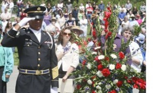 Retired 1st Sgt. John Yaw was a member of the honor guard participating in laying wreaths during the Memorial Day ceremony Monday at Tahoma National Cemetery.