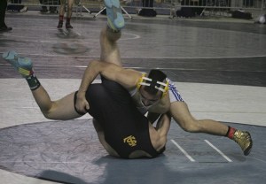 Cruz Velasquez wins the semifinal match 5-3 in overtime against Jake Douglas Feb. 22 at the Tacoma Dome.