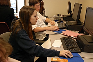 Tahoma High senior Lexie Vick works on an assignment in the school’s revamped alternative education program. It has given her the tools to help her graduate on time.