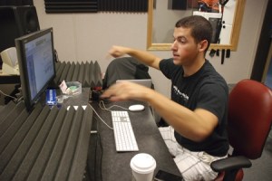 Nick Kristoffersen explains the set up of the recording studio at The Den in Maple Valley. Kristoffersen manages the studio for the community center.