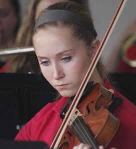 The Maple Valley Youth Symphony Orchestra performed at the opening day of the Maple Valley Farmers Market.