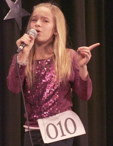 Isabella Staley sings “Black Horse and A Cherry Tree” by K.T. Tunstall during the Maple Valley Idol Jr. contest at Tahoma Middle School on March 23. Staley won the contest.