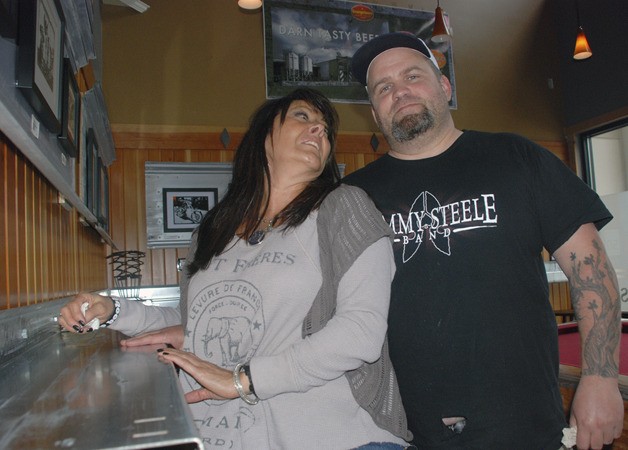 Belinda Ferguson looks at business partner Derrick Garrett at their recently opened venture