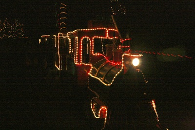 The holiday express trackless train gives rides to kids and parents at the 'Holiday Lights at the Lodge' event Wednesday.