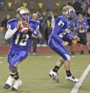 Tahoma quarterback Travis Montoya prepares to throw down field against Kentridge Friday.