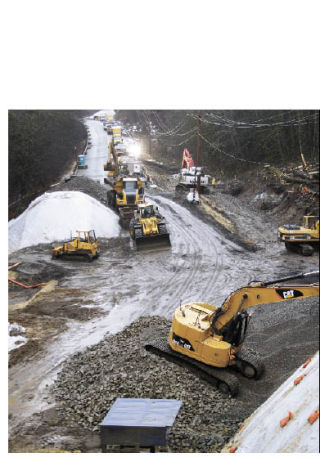 Heavy machinery has dug a gaping chunk out of the roadway as part of a seven-month