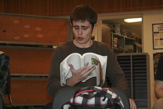 Tahoma’s Ben Fisher sings during a rehearsal for the school’s upcoming drama production “Into the Woods.” Fisher plays two roles.