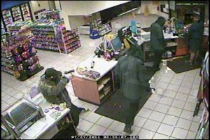 Surveillance photo from the convenience store robberies from both Maple Valley and Federal Way.