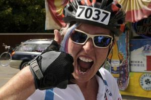 Laura Bingle gives the thumbs up during the Seattle to Portland Bicycle Classic which she rides with Team Joy in honor of her mother