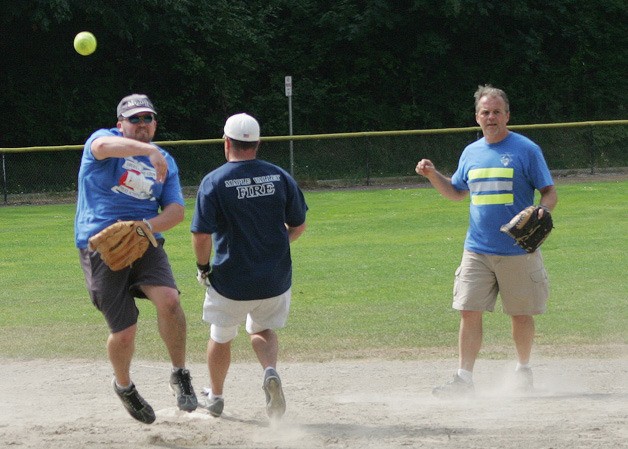 The 'Guns and Hoses' softball game between the Maple Valley Police Department and Maple Valley Fire and Life Safety at Lake Wilderness Park Sunday