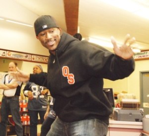 Seahawks wide receiver Nate Burleson shows off his ‘Hawk Nasty’ touchdown dance at the request of students.