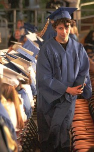 New Tahoma grad Aaron Aston returns to his seat after graduating June 11.