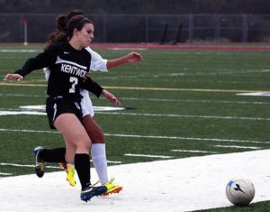 Kentwood’s Ashley Rolsma defends a Kentlake player during a match in October. Rolsma