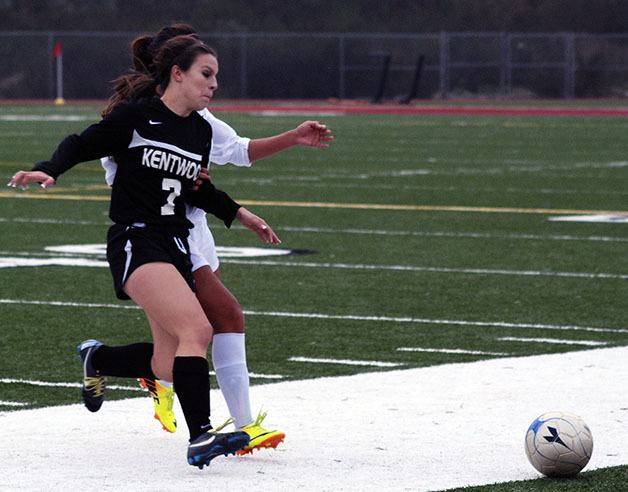 Kentwood’s Ashley Rolsma defends a Kentlake player during a match in October. Rolsma