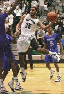 Senior Malike Sanchez dunks against Federal Way on Jan. 16. Sophomore guard Darius LuBom  attempts a leaping pass around multiple defenders. Senior Josiah Bronson defends an Eagles guard during a double-team.