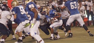 Tahoma junior Caleb Brown looks for a hole in the defense against Decatur on Sept. 26. The Bears stormed back from a first half deficit for a 28-21 win