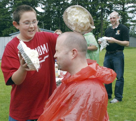 On the last day of school Erin Burkard got to gently smash a pair of whip cream pies in the face of Chad Golden