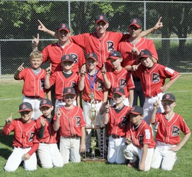 The Maple Valley Bombers 9U baseball team celebrate after winning their fourth tournament in six tries this summer. Front row: Michael Alar