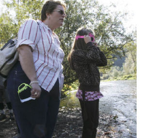 If people on the banks of the Cedar River look close enough these days
