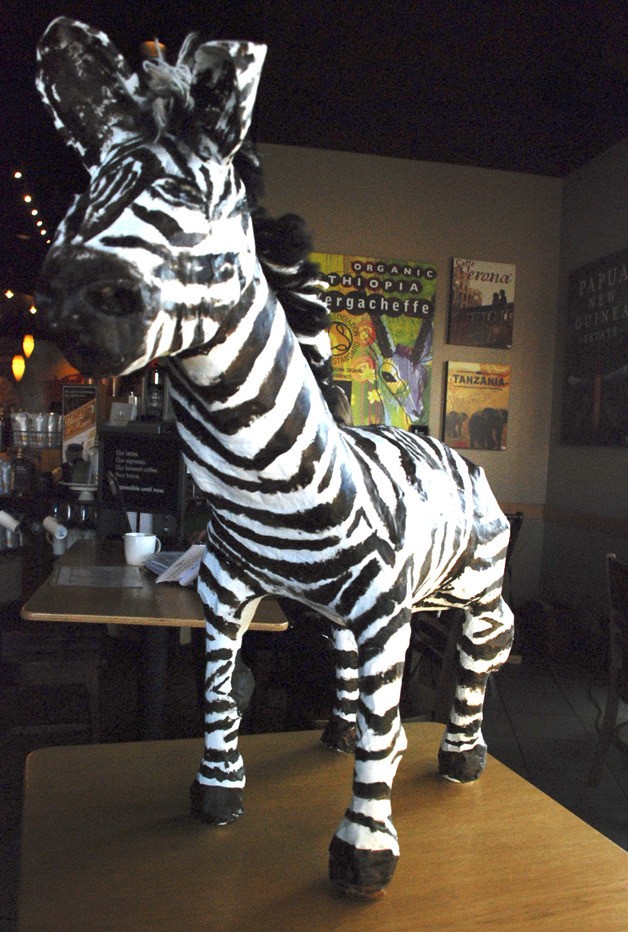 A paper mâché zebra is an example of the type of art Cathi Christianson created for her first solo art show.