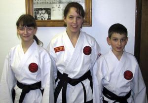 Brother and sister Nick and Emily Huber of Maple Valley recently earned Tae Kwon Do black belts.
