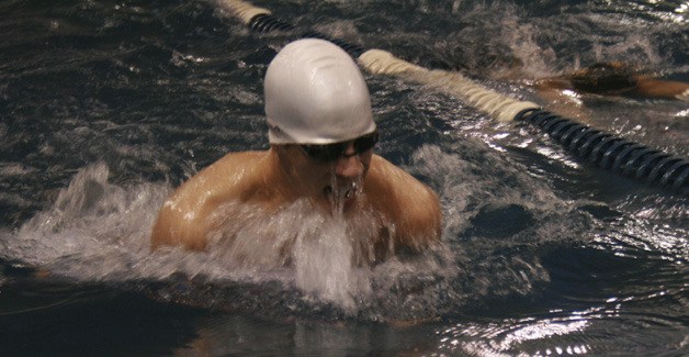 A Tahoma swimmer competes against Kentlake at their Jan. 5 meet at the Covington Aquatic Center.