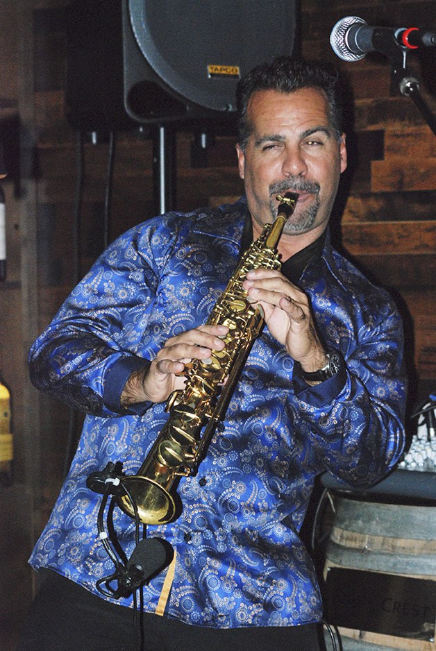 Former Kent School District music teacher Darren Motamedy performed Saturday night at The Spot in Maple Valley.