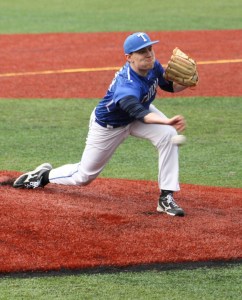 Senior Derek Browne throws a pitch during the first half of the March 19 game against Todd Beamer.