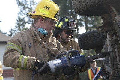 Firefighter Michael Johnson and Brian Bratz