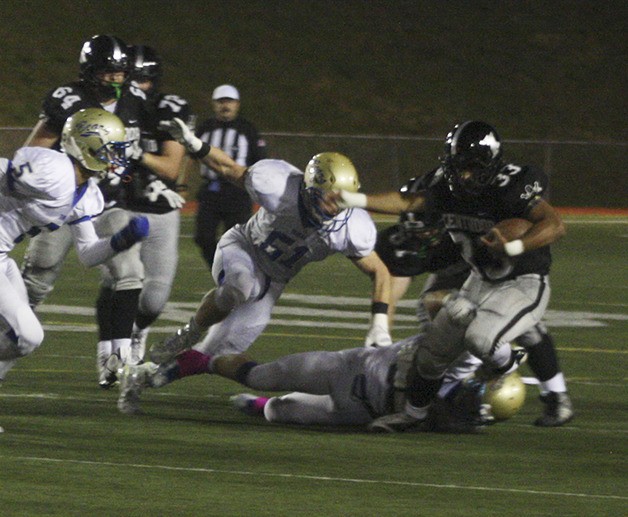 Kentwood junior running back Chavez Kalua-Fuimaono