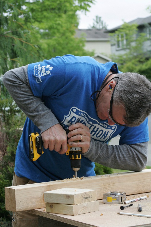 A worker from Rampathon constructs part of the ramp.