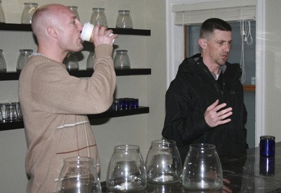 Green Group Society owner Chris Schoonover (right) and his business partner Jon Hofer (left) at the grand opening in Maple Valley. The business specializes in 'palliative care and networking solutions