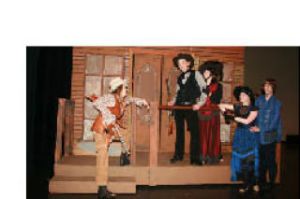 Scenes from Kentlake High School’s “Annie Get Your Gun” include this one with Gabbi DeWalt