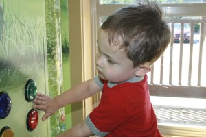 JT Abernethy plays in the main hallway at the Children’s Therapy Center in Kent. The Center is geared towards young children and has a variety of toys available in the waiting area.