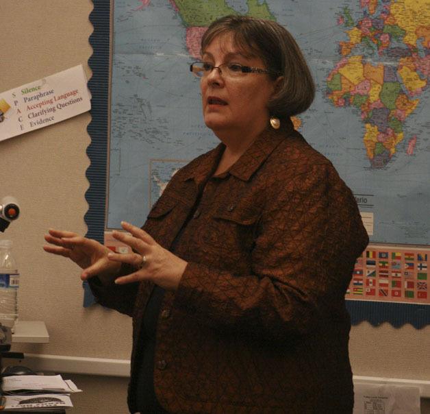 Mary VanHoomissen discusses potential careers in the health care industry with Tahoma Junior High students on Future Ready Day.