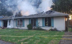 Kent and Maple Valley firefighters fought this home fire in the Timberland area of Covington Tuesday morning.