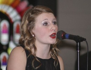 Hannah Fiskum sings a solo during the Tahoma High School's jazz choir performance of 'California Dreamin'' Friday during the jazz benefit at the school.