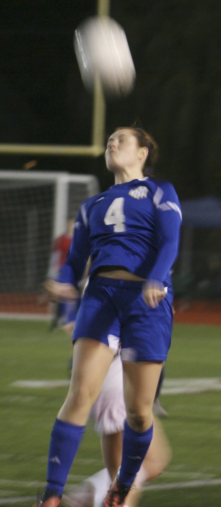 Madison Haines fights for a header during Tahoma's 2-0 win against Curtis in the district tournament on Nov. 8.