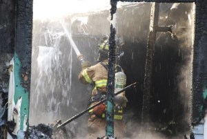 Fire investigators reported this fire in a Kent home was caused by an unattended candle.