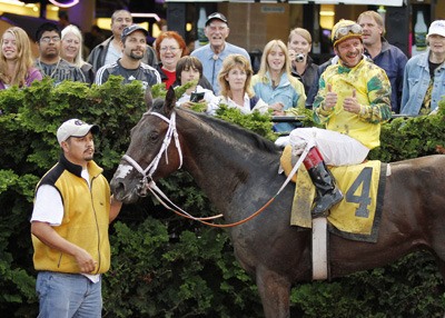 Couldabenthewhisky and Gallyn Mitchell in the winner's circle after a five-length victory in the 73rd running of the $75