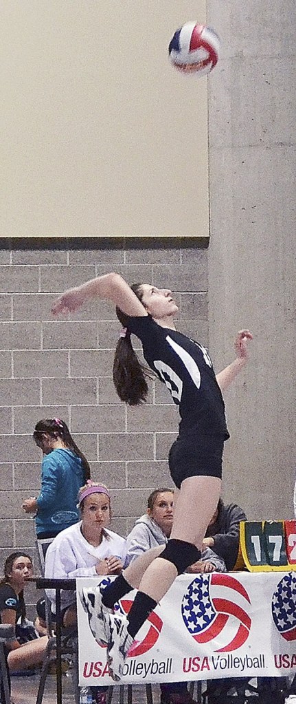 Zvezdi Krasteva goes up for the kill in a U-14 match for Synergy during the club’s third season.