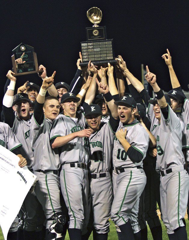 Kentwood’s baseball team celebrates its 4-1 victory over Puyallup in the 4A state championship game on May 26 at Gesa Stadium in Pasco.
