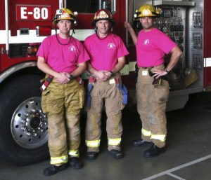 Maple Valley firefighters daring to weak pink during Breast Cancer Awareness month.
