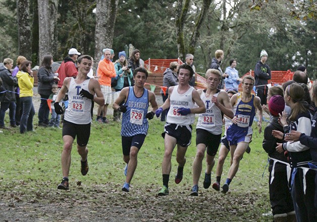 Graeme Schroeder and Tristan Houser in the home stretch of the West Central District meet Saturday at American Lake.