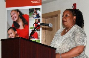 Cynthia Liggett speaks during the grand opening of the YWCA Passage Point. Liggett was a participant in the program.