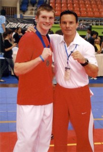 Tyler Phippen and Pan Am Junior championship coach Juan Moreno.
