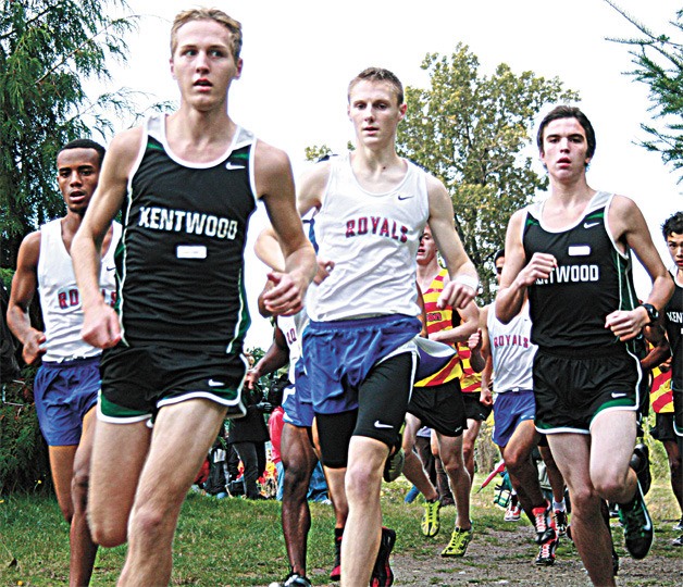Kentwood senior Danny Lunder (second from left) runs ahead of Kent Meridian’s Teddy Teklu (far left) and Stewart Kunzleman