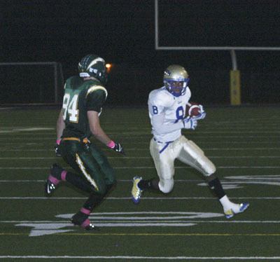 Tahoma receiver Caleb Holloway makes a run after a reception Friday at French Field in a game against Kentridge. Tahoma won 36-34 on a 47-yard field goal in the closing seconds of the game.
