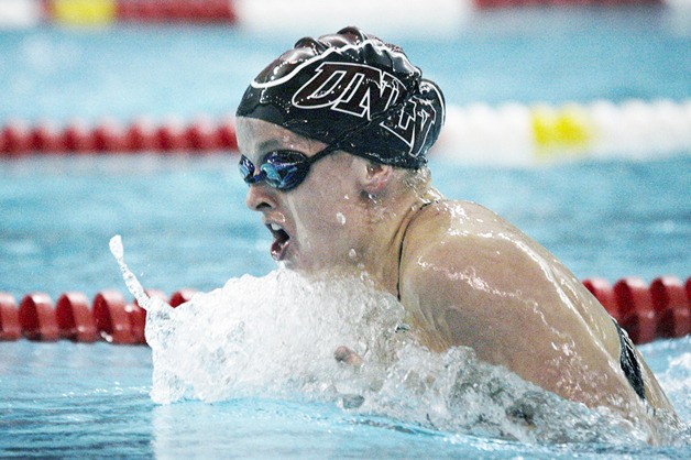 Kentwood graduate Marley Prother swims in a meet at Texas Christian University for UNLV. Prothero